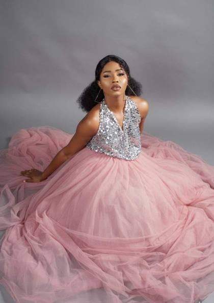 Pink tulle ball gown with sequin halter top